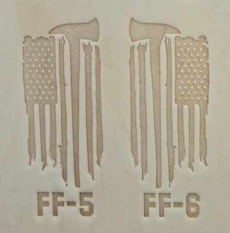 Delrin leather stamp pressing a tattered U.S. flag design with a firefighting axe and Halligan bar into leather.