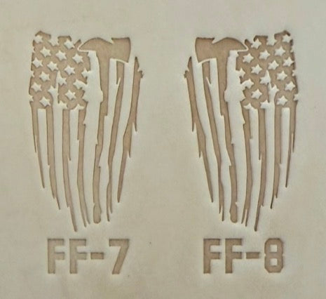 Delrin leather stamp pressing a tattered U.S. flag design with a firefighting axe and Halligan bar into leather.