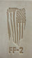 Delrin leather stamp pressing a tattered U.S. flag design with a firefighting axe and Halligan bar into leather.