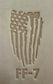 Delrin leather stamp pressing a tattered U.S. flag design with a firefighting axe and Halligan bar into leather.
