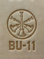 Delrin leather stamp showing firefighter bugle rank insignia.