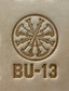 Delrin leather stamp showing firefighter bugle rank insignia.