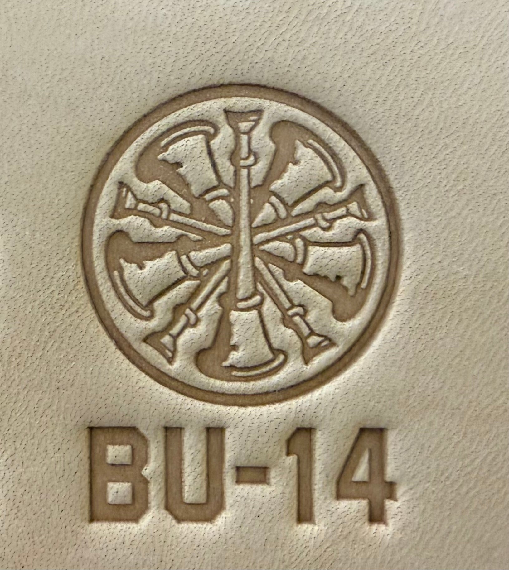 Delrin leather stamp showing firefighter bugle rank insignia.