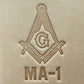 Embossing stamp featuring a Masonic square and compass emblem with the letter G.