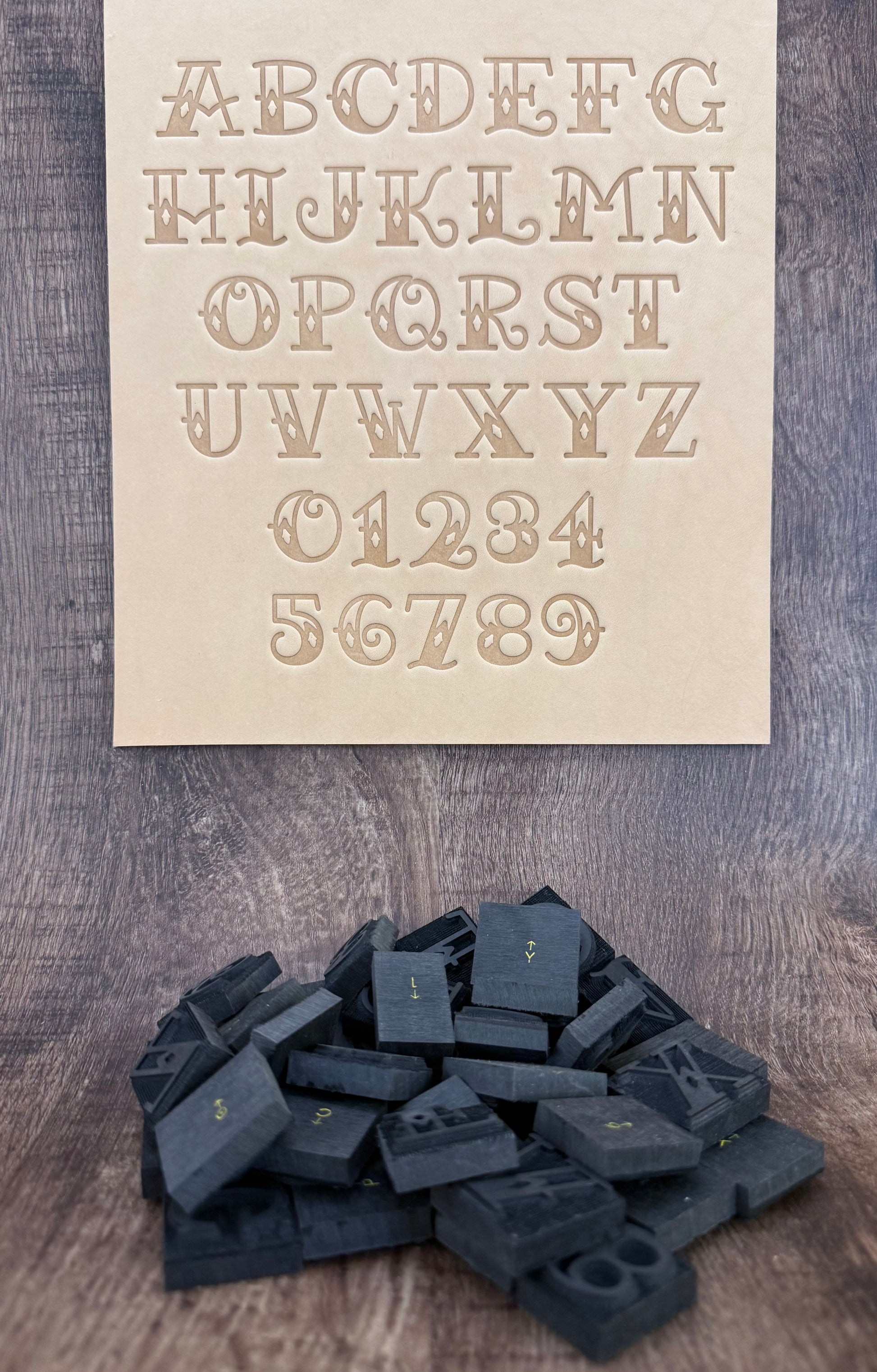 Old school Sailor Jerry tattoo style delrin alphabet letter and number stamp set for leathercrafting.
