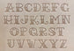 Old school Sailor Jerry tattoo style delrin alphabet letter and number stamp set for leathercrafting.