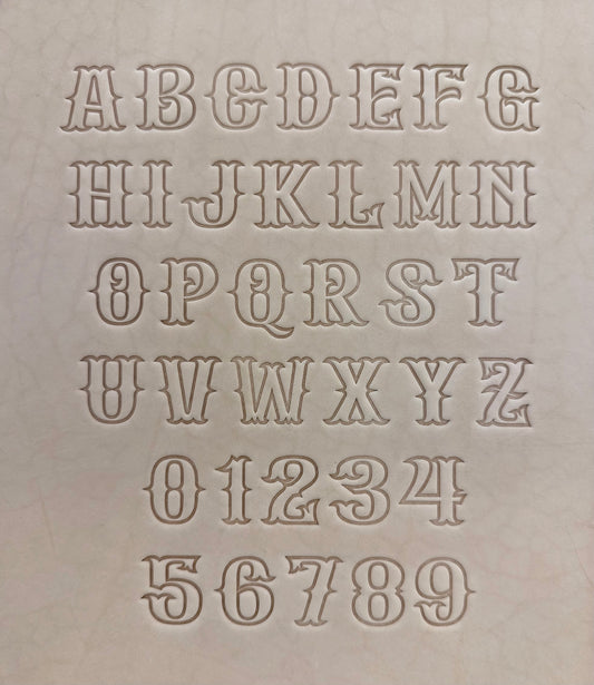 Leathercrafting embossing stamp in western style font.