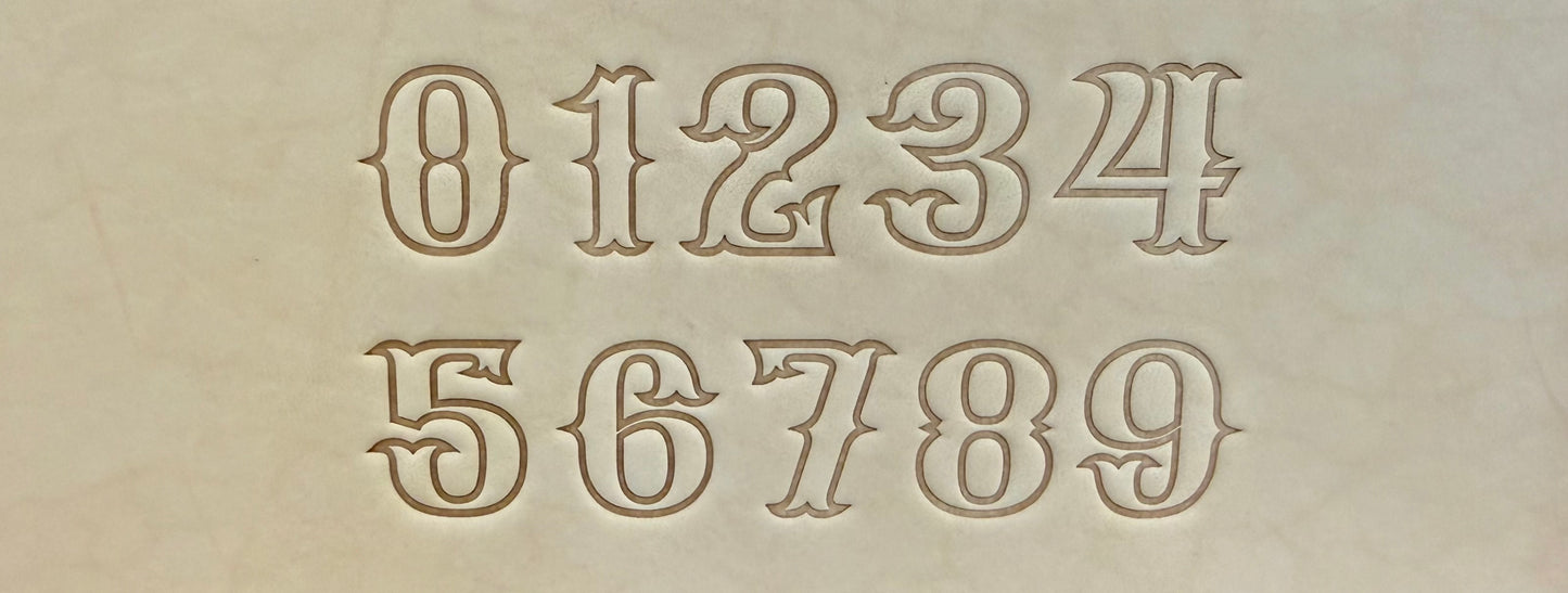 Leathercrafting embossing stamp in western style font.